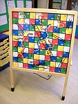 Snakes and Ladders board